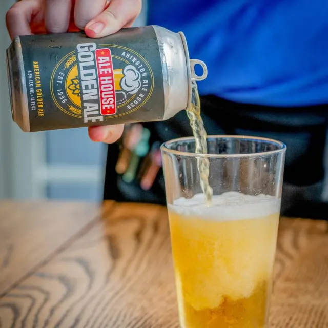 Ale House Golden Ale being poured into a glass