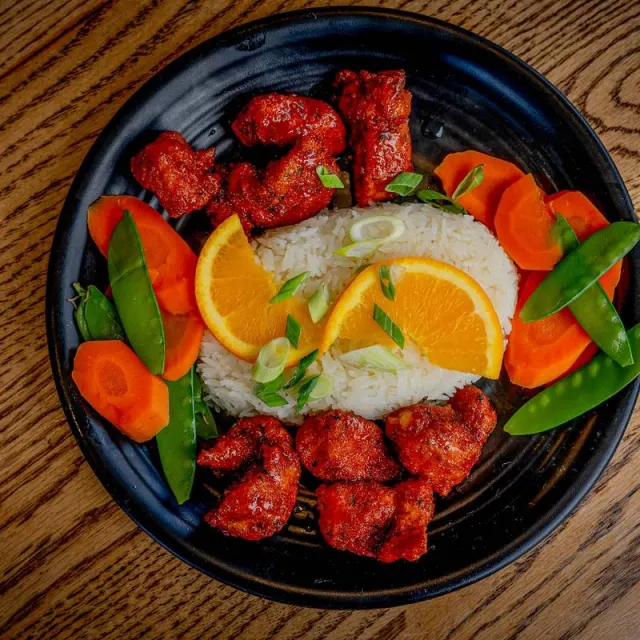 Orange chicken with rice and vegetables